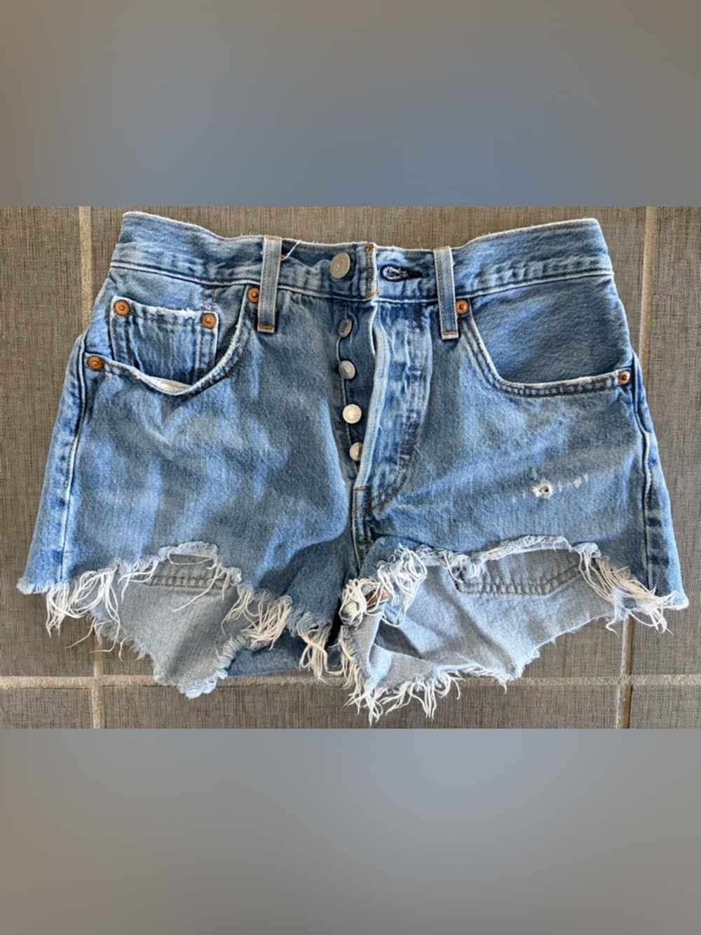 Levi's Light Blue Button-Front Distressed Denim Shorts